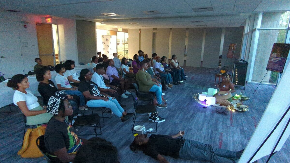 Jessica facilitating a donation-based healing circle